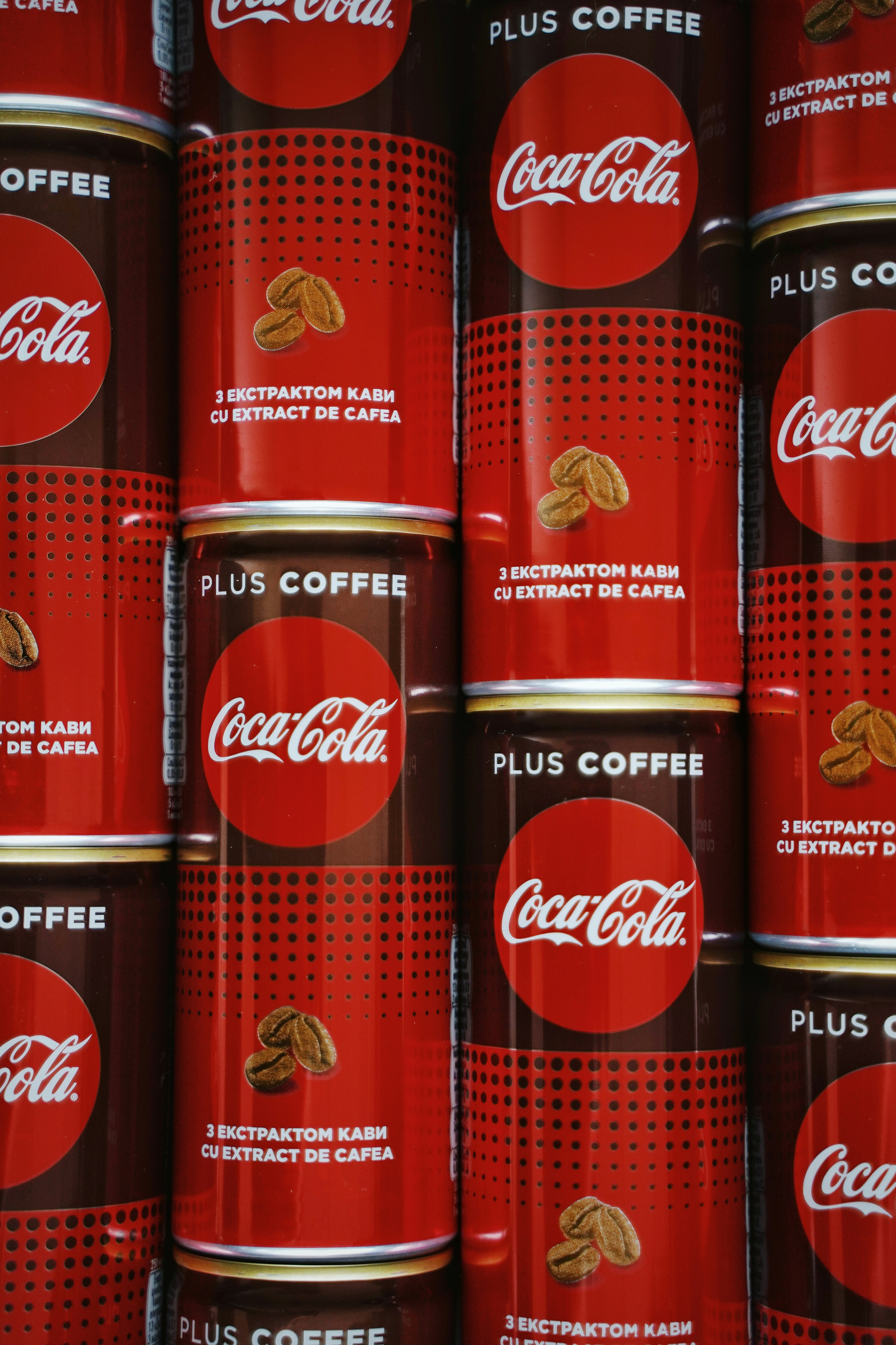 coca cola can on brown wooden table